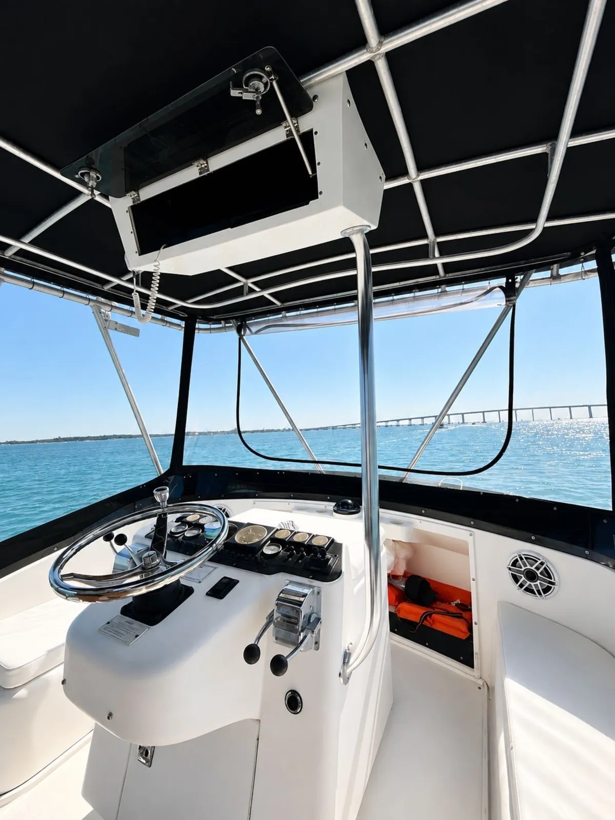 The helm of the Luhrs, looking out at the Key Biscayne bridge